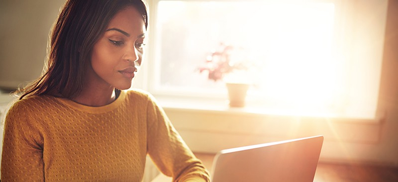 A woman using a laptop